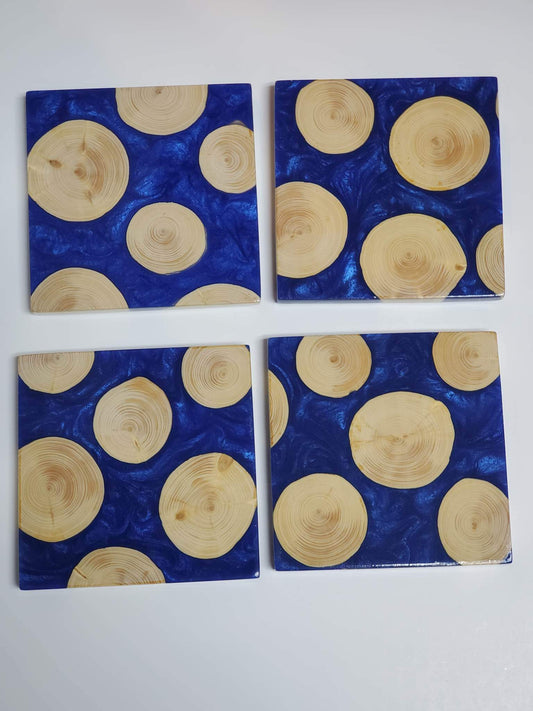 Fir Discs and Blue Epoxy River Coasters